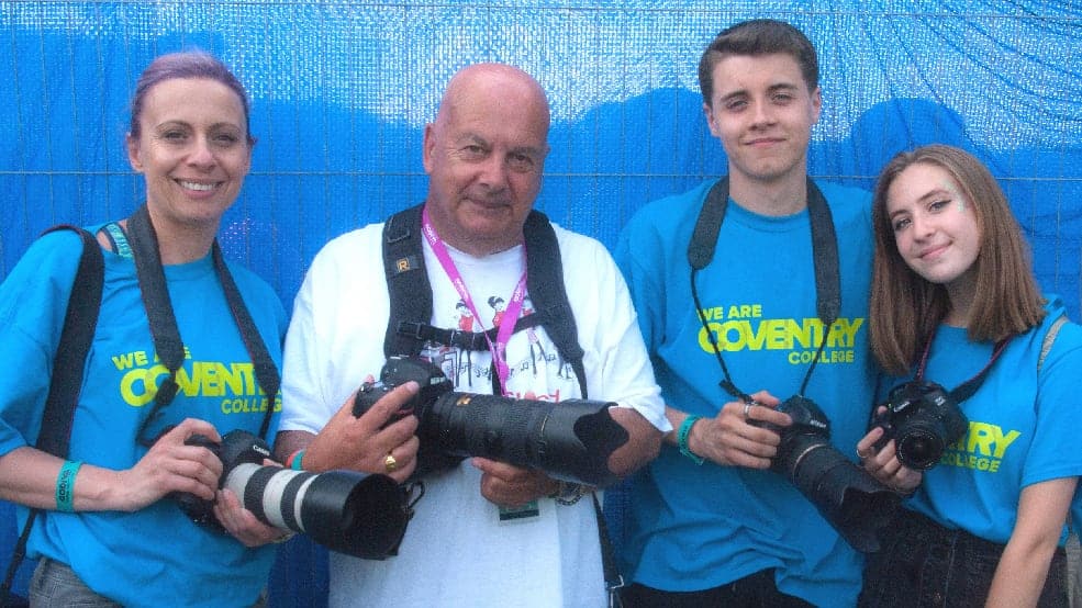 Coventry students pose with photographer John Coles at Godiva Festival