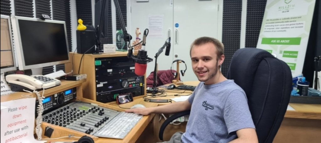 Learner conor sturmey in a radio studio