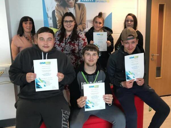 Coventry college employability hub students with their certificates