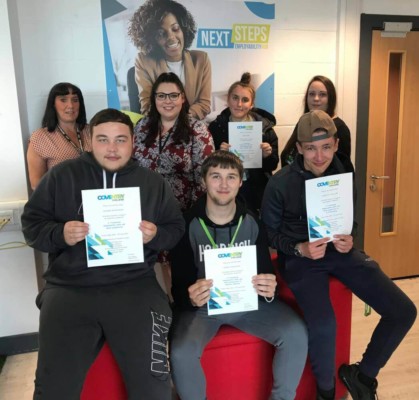Coventry college employability hub students with their certificates