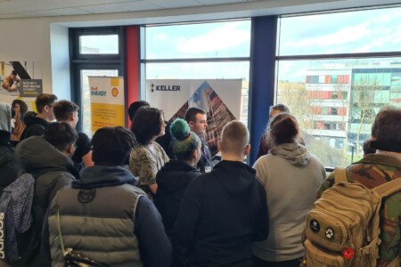 Learners speaking to employers at a Motor Vehicle Careers Fair