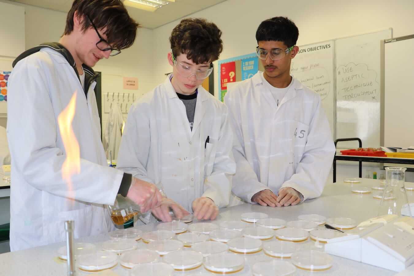 Coventry college science lab students using equipment