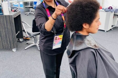 Hair learner pampering athlete at commonwealth games