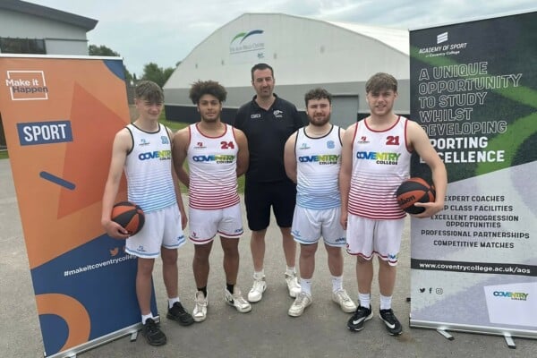 Paul adams from coventry tornadoes with coventry college basketball students