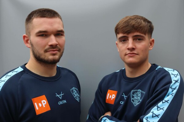 Two coventry rugby players stood side by side