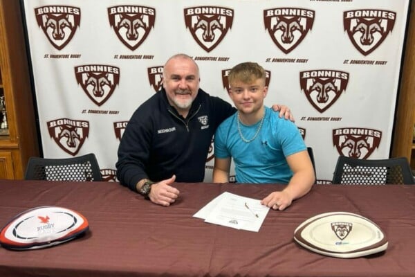 Harry Quance with representative from St. Bonaventure University