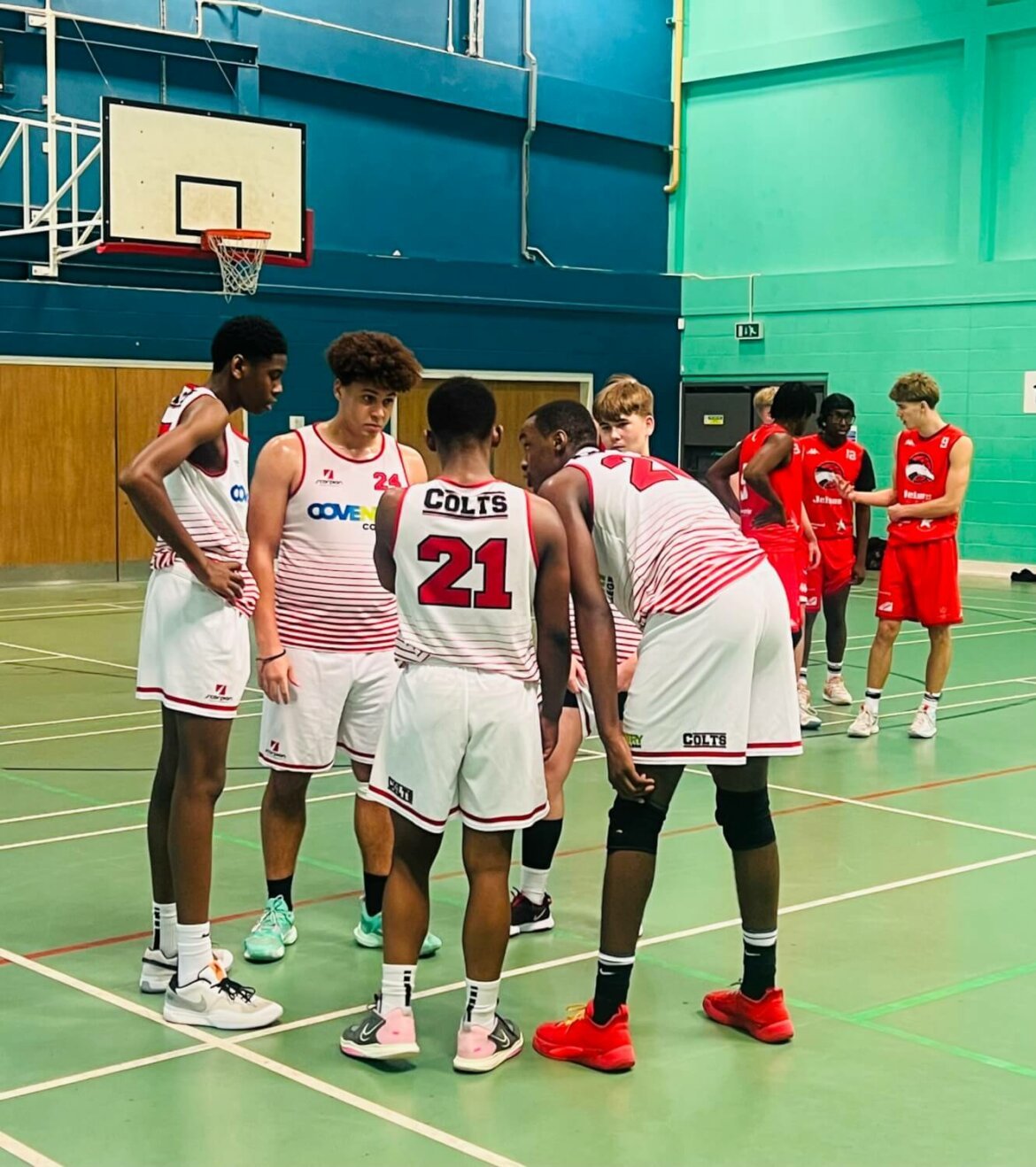 Basketball Team in huddle