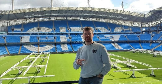 Learner Philip Roberts who completed an Access to HE at a football stadium