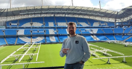Learner Philip Roberts who completed an Access to HE at a football stadium