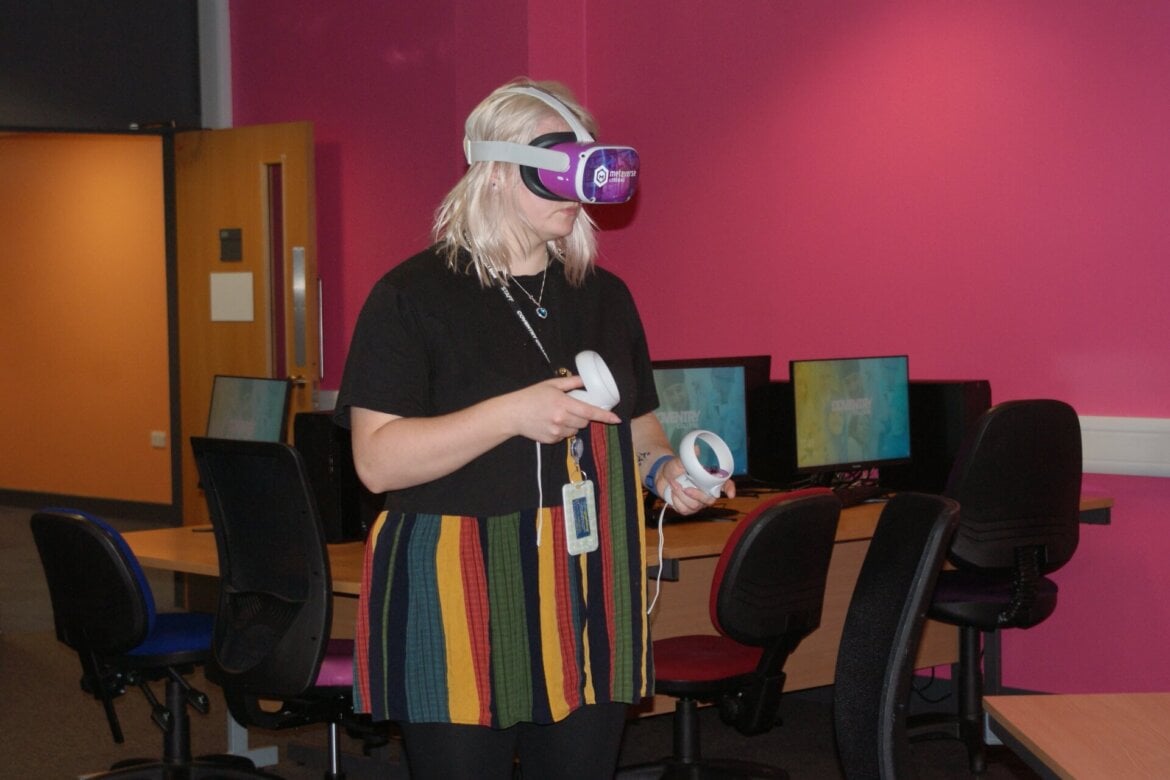 Staff member using VR headset