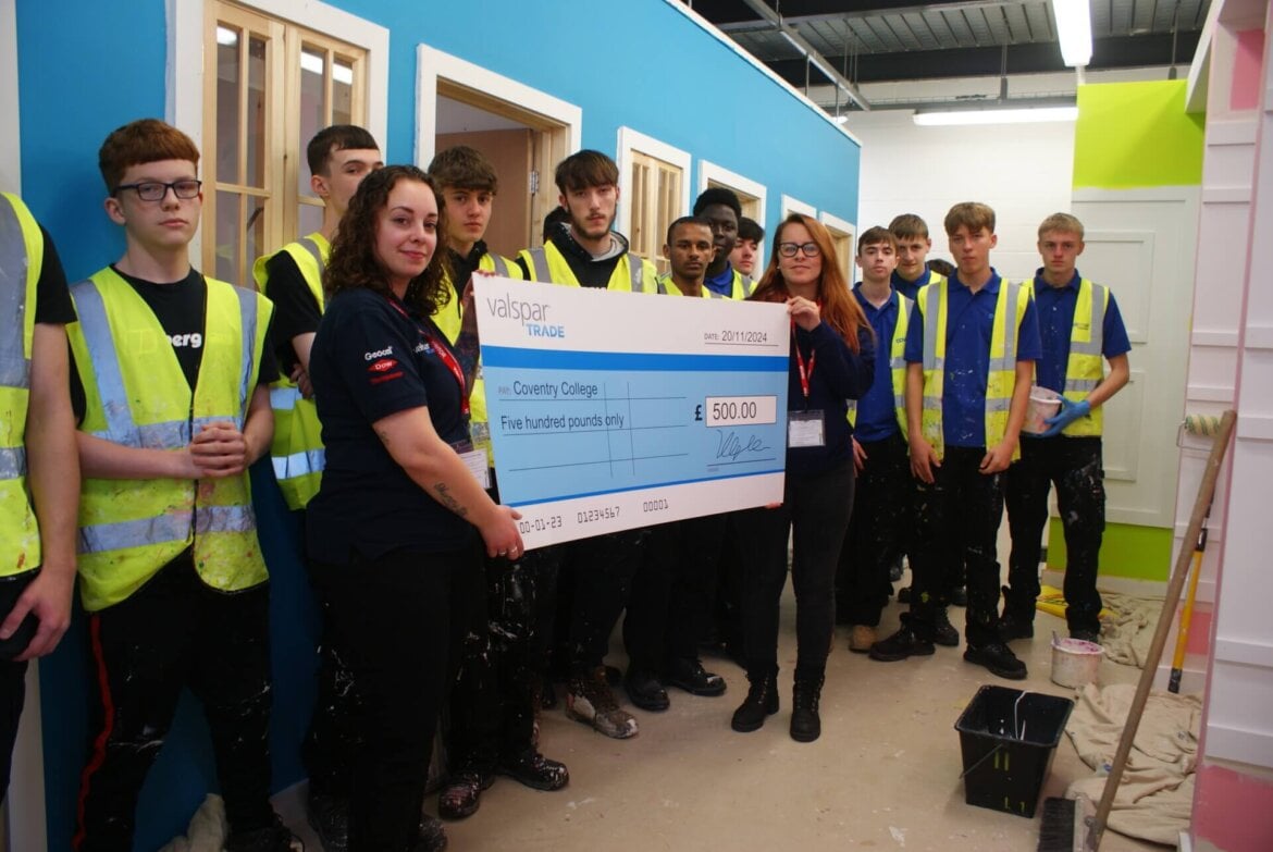Representatives from Valspar Trade presenting cheque to group of Painting and Decorating learners