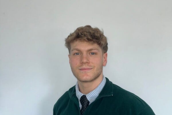 A headshot of Ethan Brown