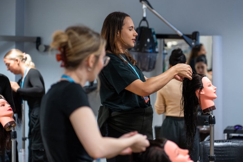 coventry college hair and beauty students practicing hairdressing