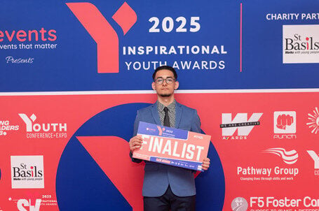 Alexandru winning Inspirational Youth Award