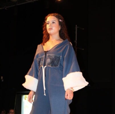 fashion student posing on catwalk