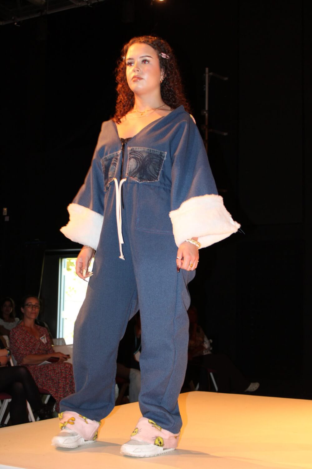 fashion student posing on catwalk