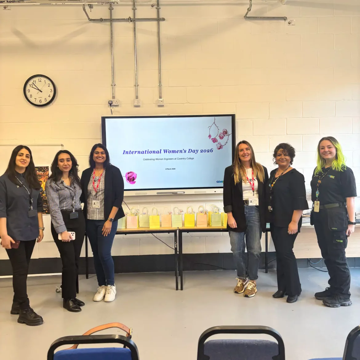 Managers form Jaguar Land Rover with female staff from Coventry College